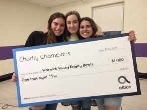 WVHS Empty Bowls Club Members proudly display their $1000 award from Altice's “Charity Champions” program.